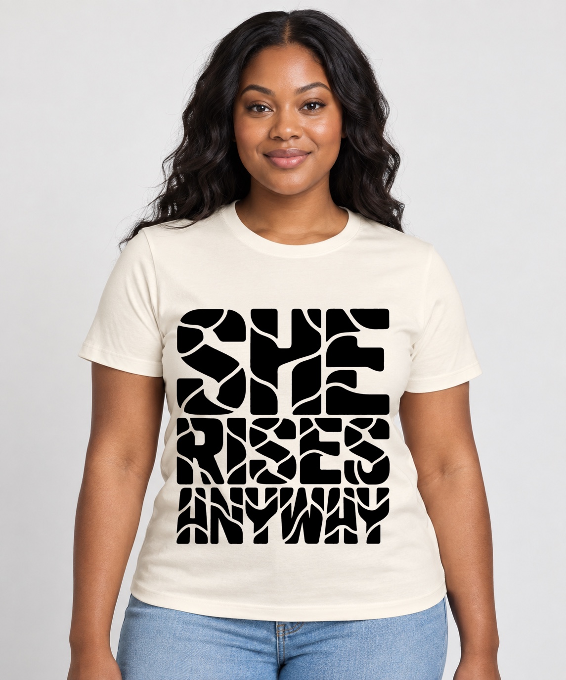 She Rises Anyway black custom shirt on a cream tee